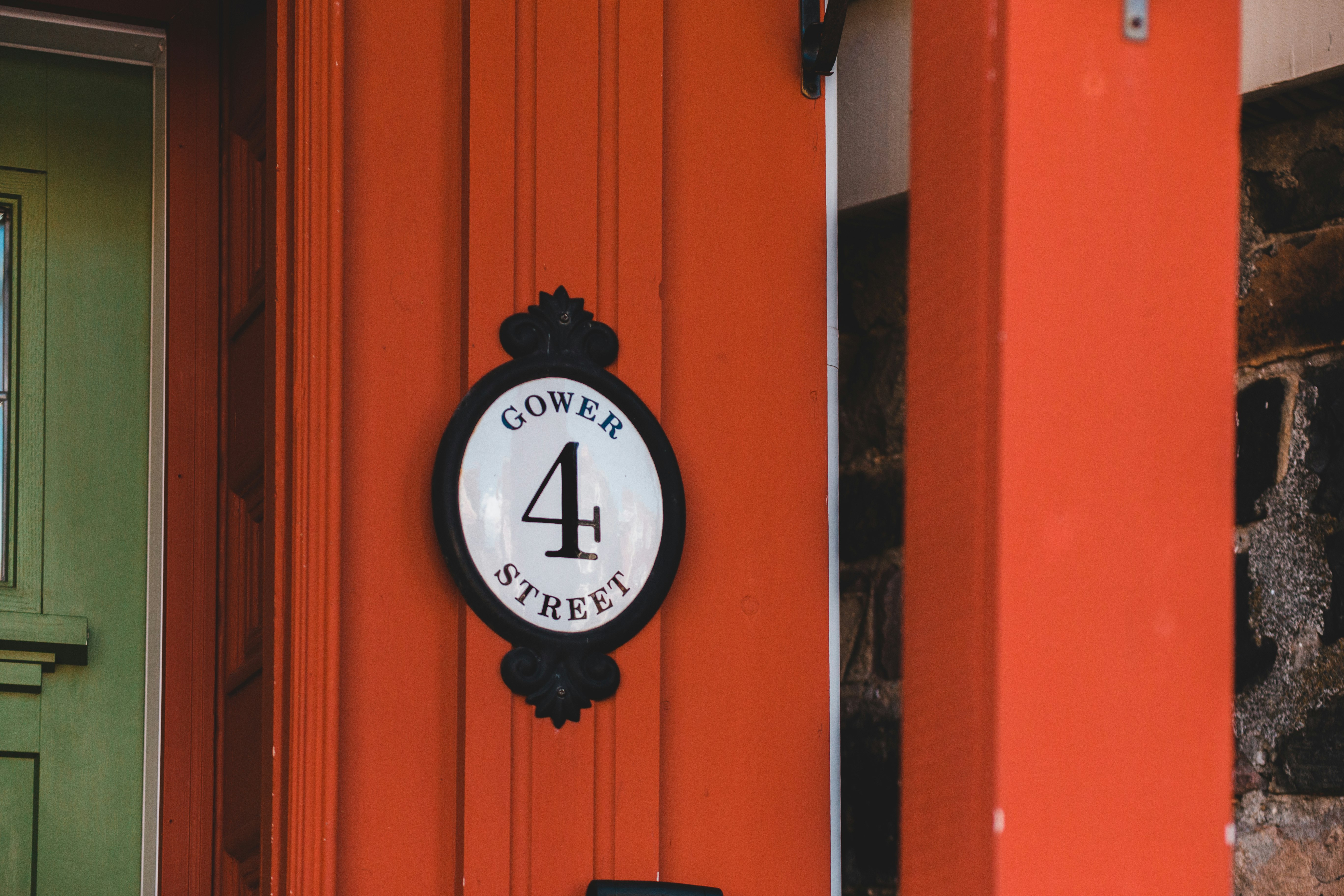 black and white analog wall clock at 10 10